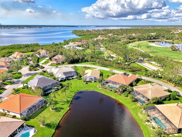 drone / aerial view with a water view