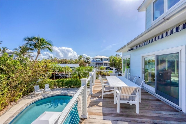 view of pool featuring a wooden deck