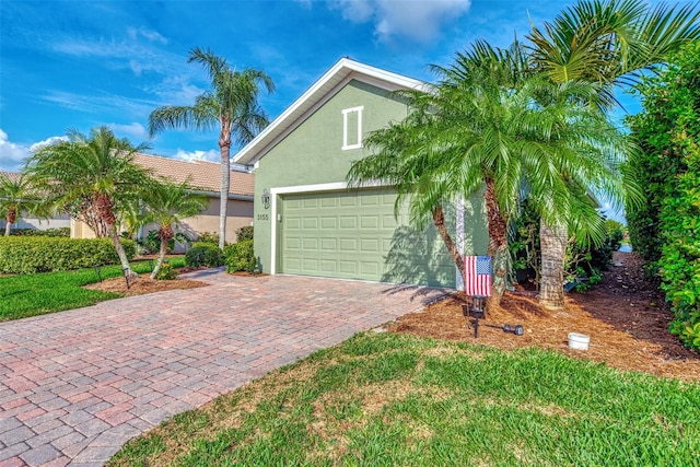 view of front of property featuring a garage