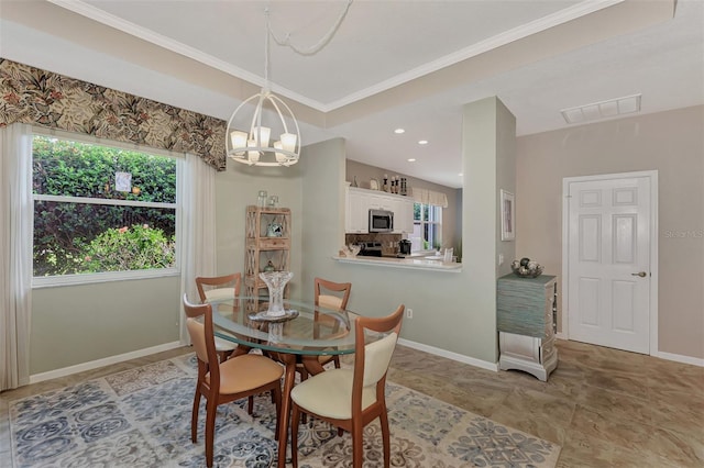 dining area with an inviting chandelier and crown molding