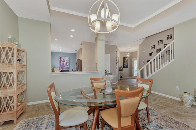 dining room with a chandelier and crown molding