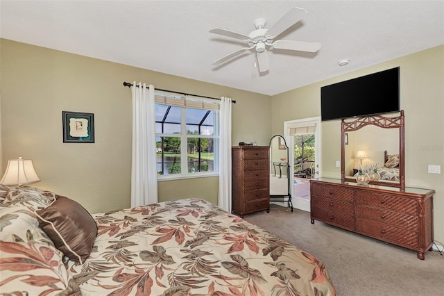 bedroom with light carpet and ceiling fan