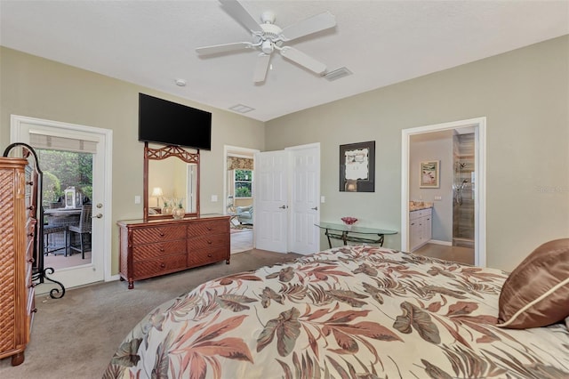 bedroom featuring access to exterior, light carpet, ceiling fan, and connected bathroom