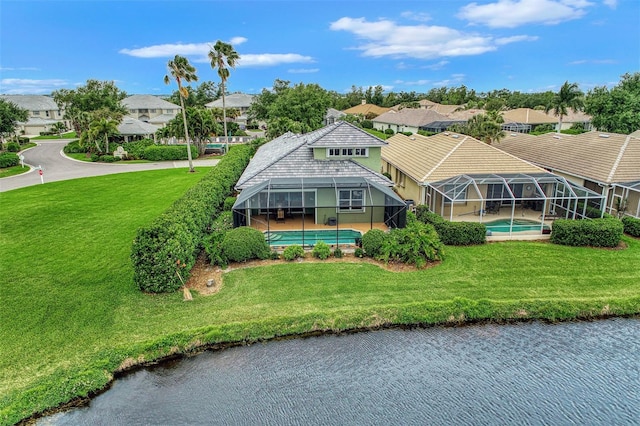 drone / aerial view with a water view