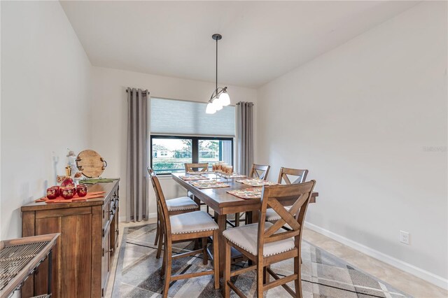 view of carpeted dining space