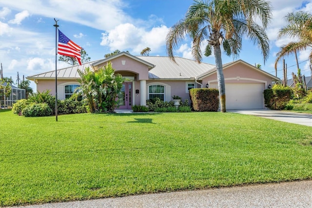 ranch-style home featuring a garage and a front yard