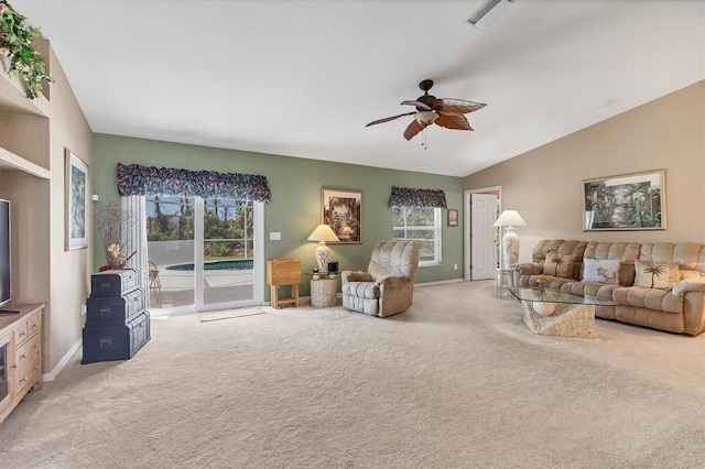 carpeted living room featuring lofted ceiling and ceiling fan