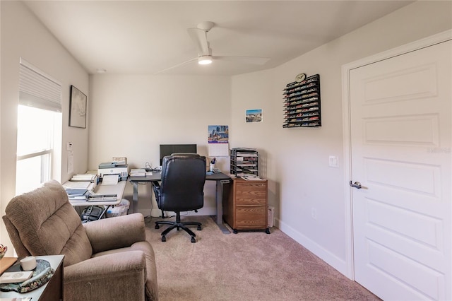 carpeted office with ceiling fan