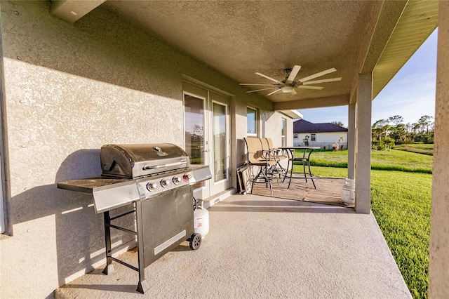 view of patio / terrace featuring ceiling fan