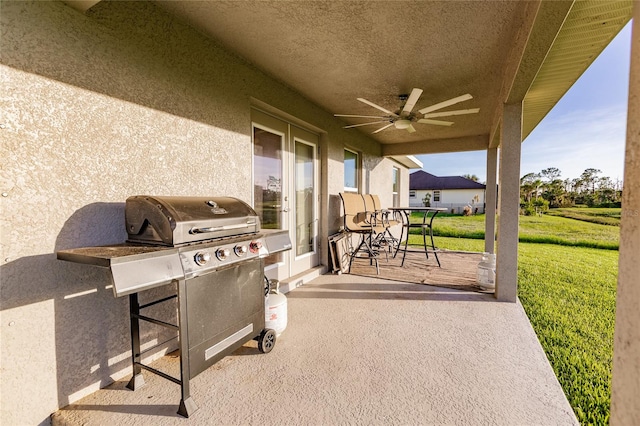 view of patio featuring grilling area and ceiling fan