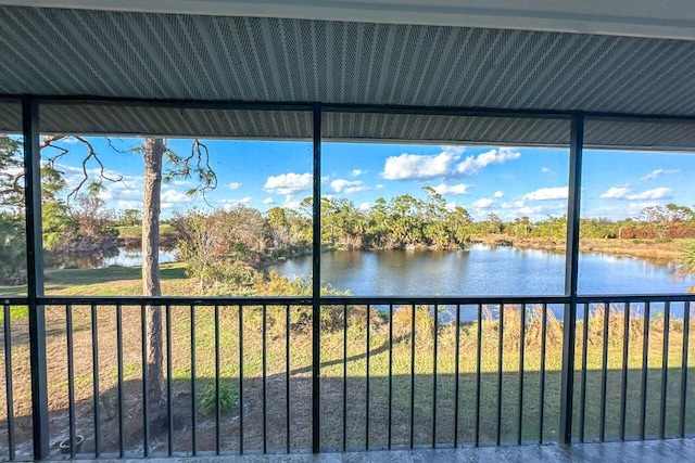 exterior space with a water view