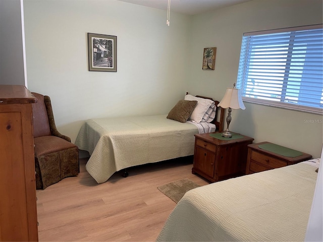 bedroom with light hardwood / wood-style flooring