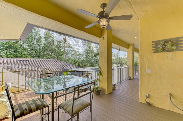 wooden deck with ceiling fan