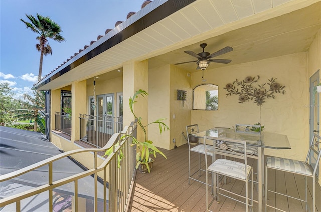 wooden terrace with ceiling fan