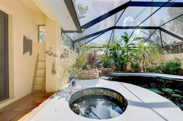 view of swimming pool with an in ground hot tub and glass enclosure