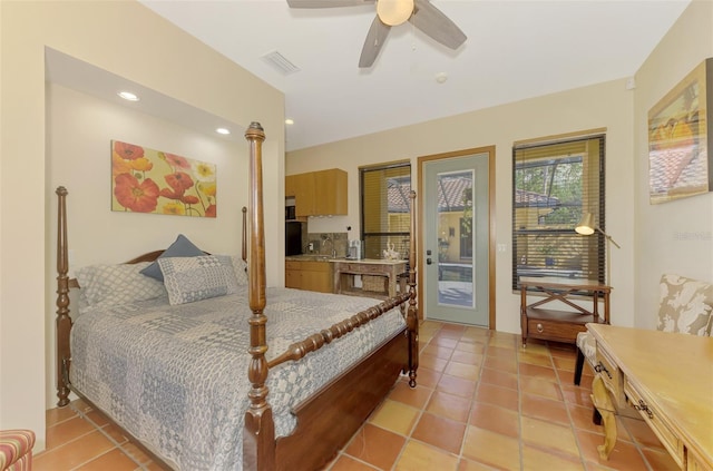 bedroom featuring access to exterior, light tile patterned floors, and ceiling fan