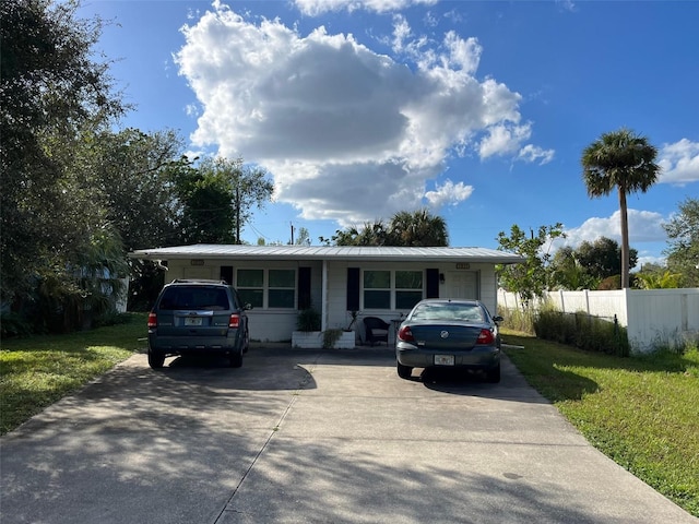 view of front of house with a front lawn