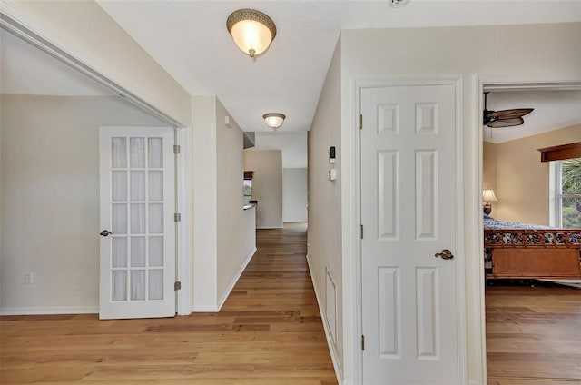 hallway featuring light hardwood / wood-style flooring