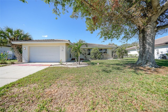 single story home with a garage and a front lawn