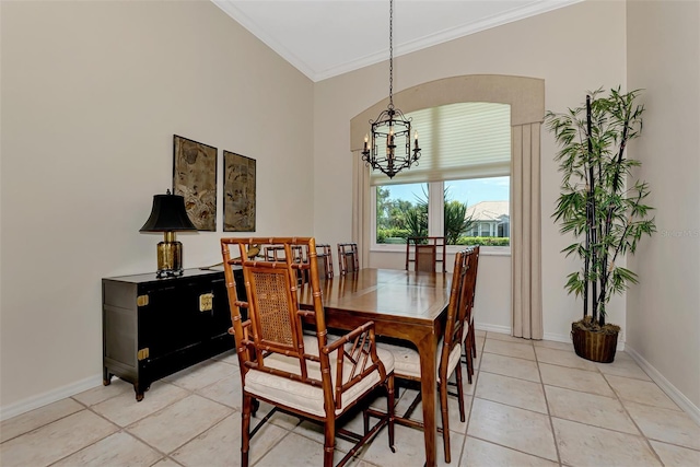 dining space featuring light tile patterned floors, ornamental molding, and a notable chandelier