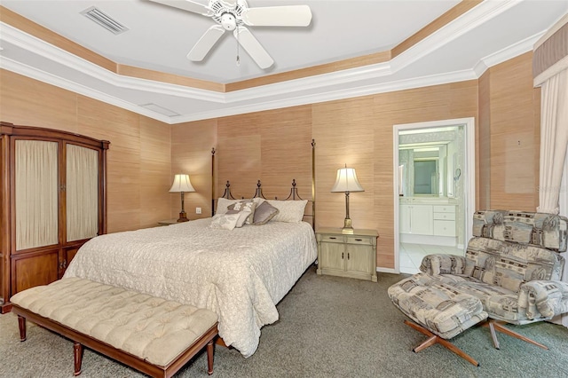 bedroom featuring ceiling fan, ornamental molding, and carpet floors