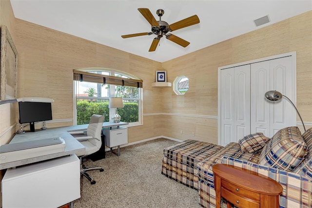 office featuring carpet and ceiling fan