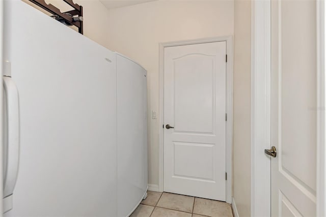 washroom with light tile patterned floors