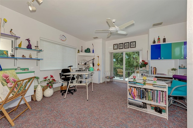 home office featuring carpet flooring and ceiling fan