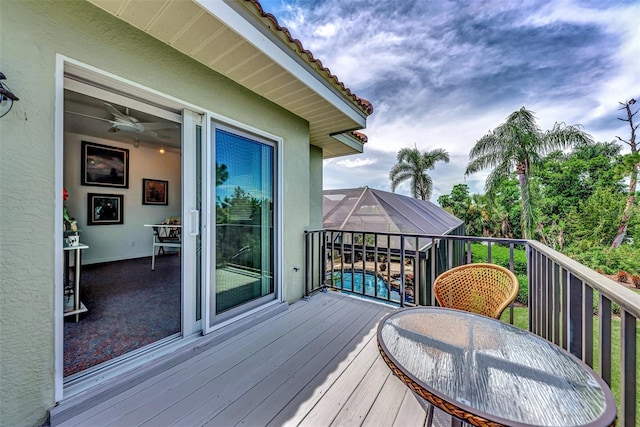 wooden deck with glass enclosure