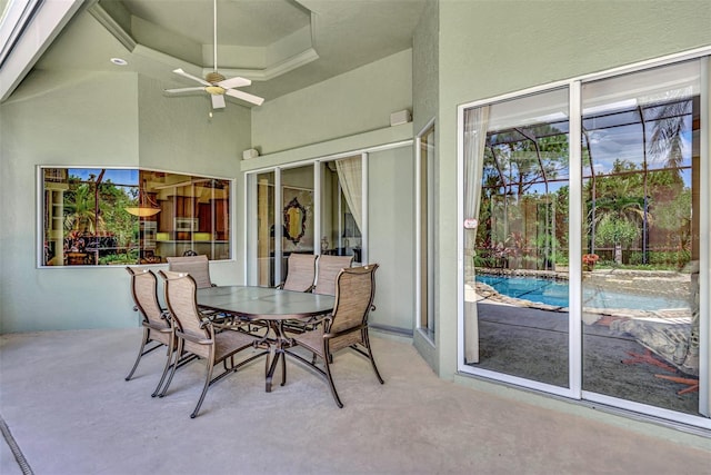 sunroom / solarium with ceiling fan