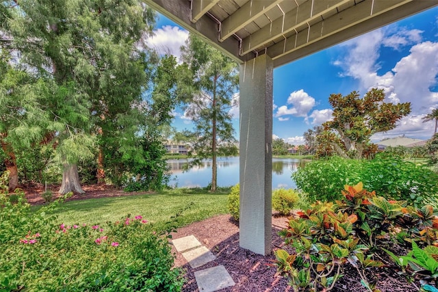 view of patio with a water view