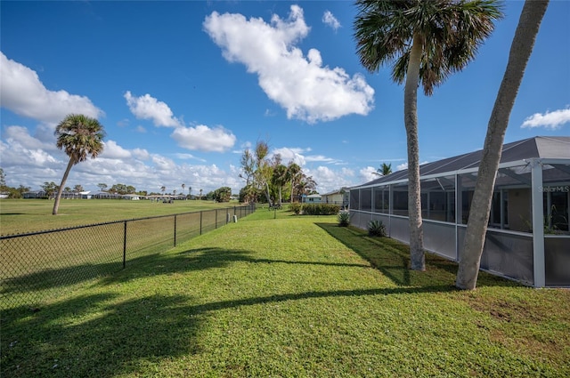 view of yard featuring a lanai