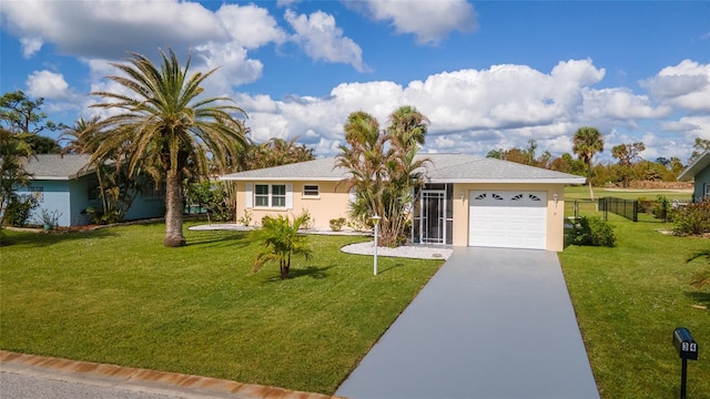 ranch-style house featuring a garage and a front yard