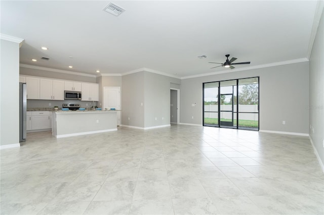 unfurnished living room with crown molding, baseboards, visible vents, and ceiling fan