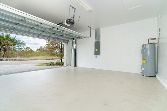 garage featuring electric panel, a garage door opener, and water heater