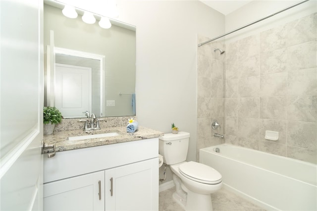 full bathroom featuring tile patterned floors, toilet, vanity, and  shower combination