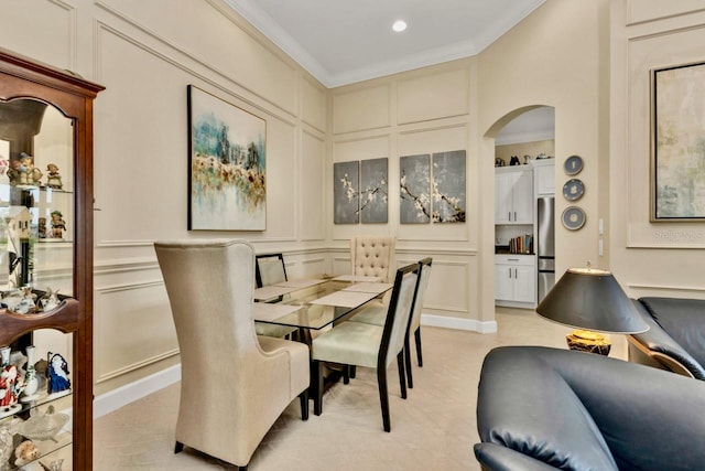 dining area featuring ornamental molding