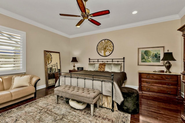 bedroom featuring crown molding, dark hardwood / wood-style floors, and ceiling fan