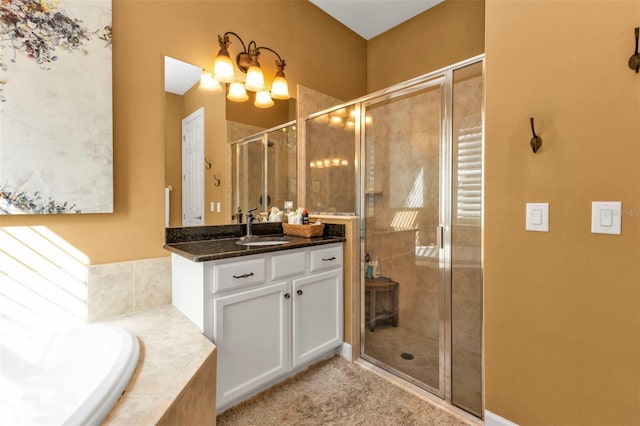 bathroom with plus walk in shower and vanity