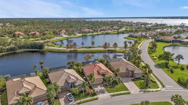 drone / aerial view with a water view