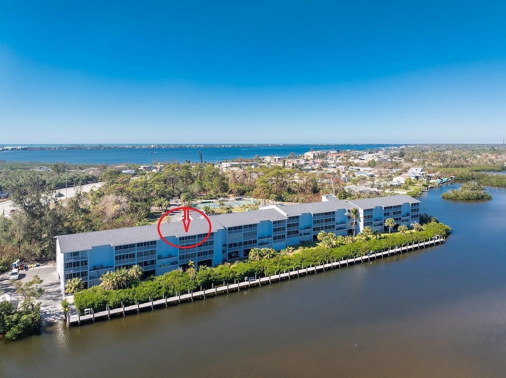 birds eye view of property featuring a water view