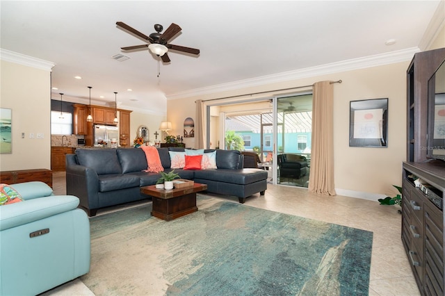 living room featuring ceiling fan, crown molding, and light tile patterned floors