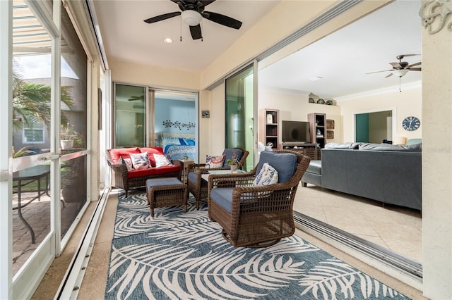 sunroom / solarium with ceiling fan