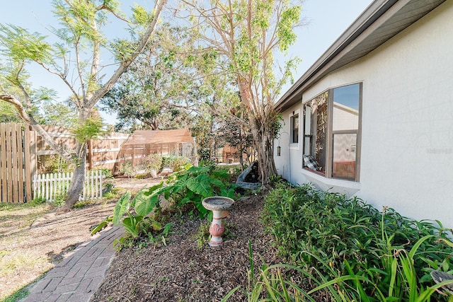 view of yard with an outdoor structure