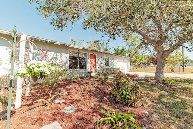 single story home with a garage