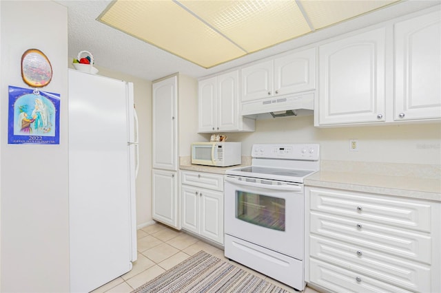 kitchen with white cabinets, white appliances, premium range hood, and light tile patterned flooring