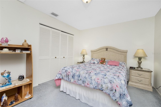 carpeted bedroom featuring a closet