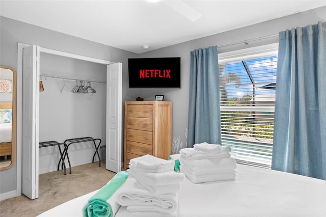 carpeted bedroom with a closet