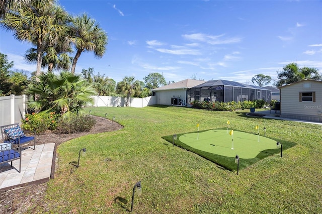 view of yard featuring a lanai