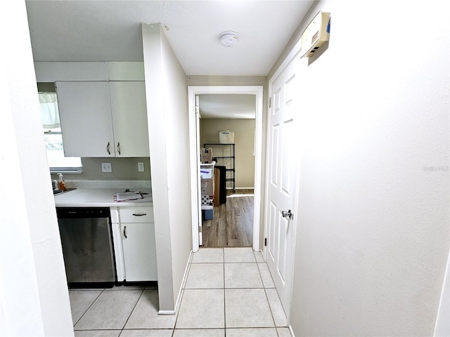 kitchen with dishwasher and light tile patterned floors